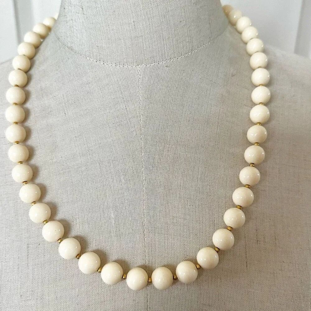 Cream and gold tone vintage long beaded necklace